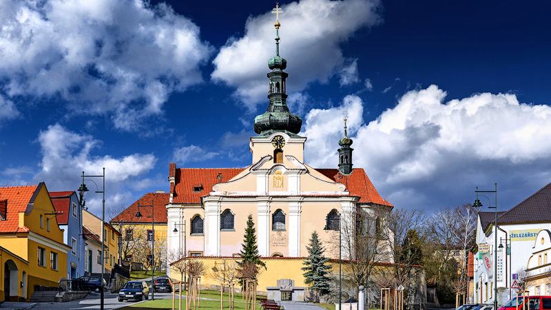 Mnichovice town. Main square with the church