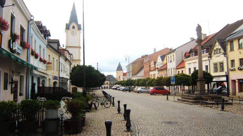 The market place of Ostrov , Karlovy Vary Region, Czech Republic. The tower on the left be